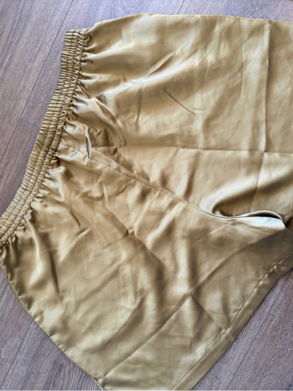 SKIMS Satin Athletic Shorts in Gold - Picture 6 of 6